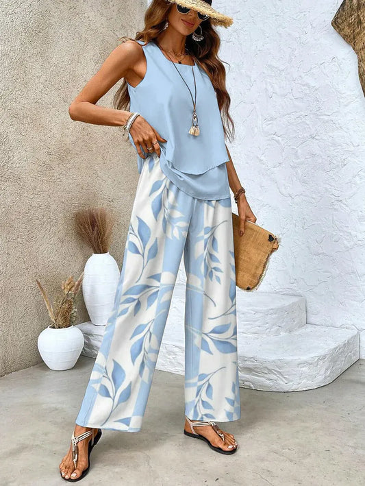 Maité - Conjunto azul de dos piezas con estampado floral y cuello cuadrado