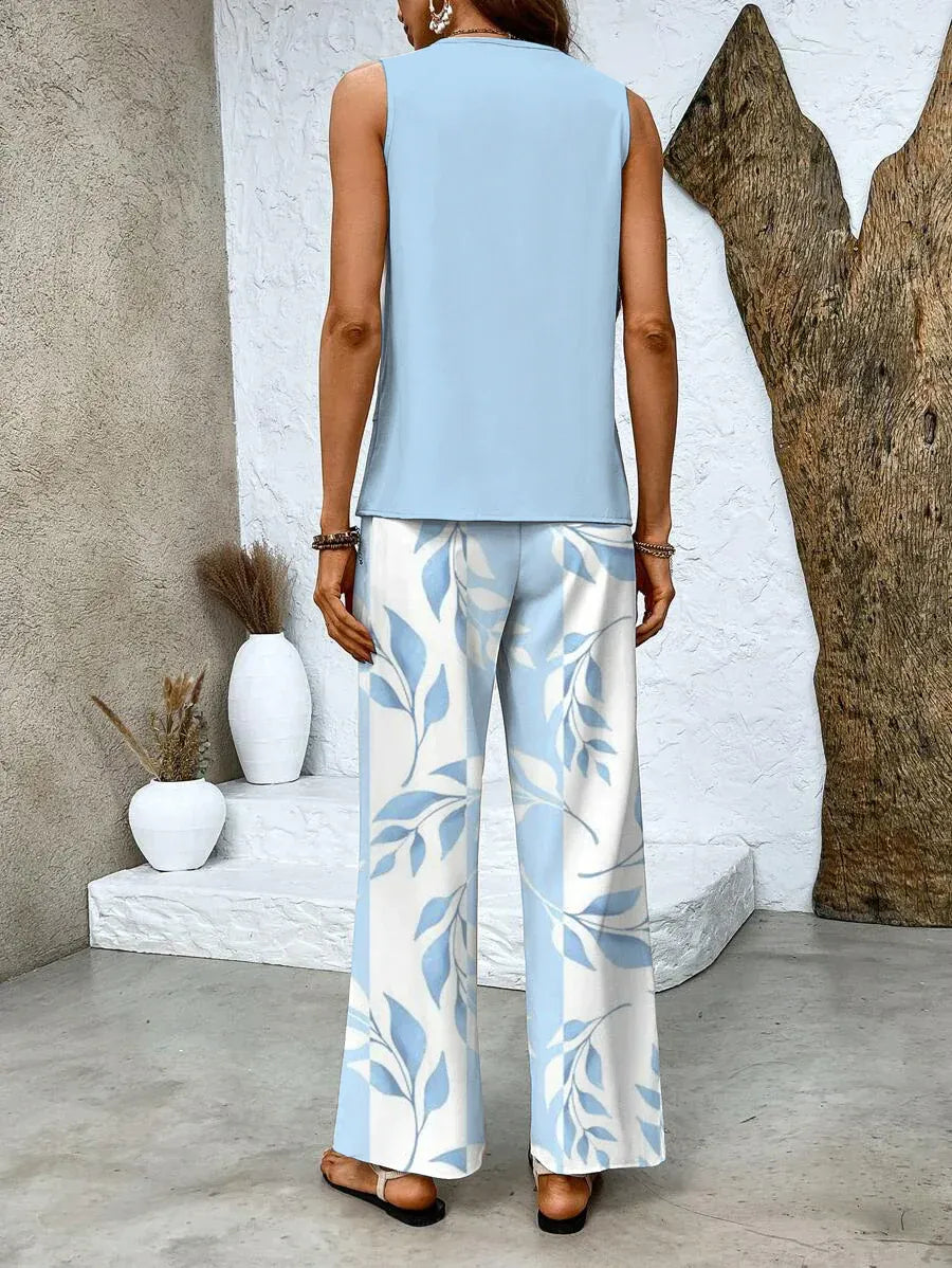 Maité - Conjunto azul de dos piezas con estampado floral y cuello cuadrado