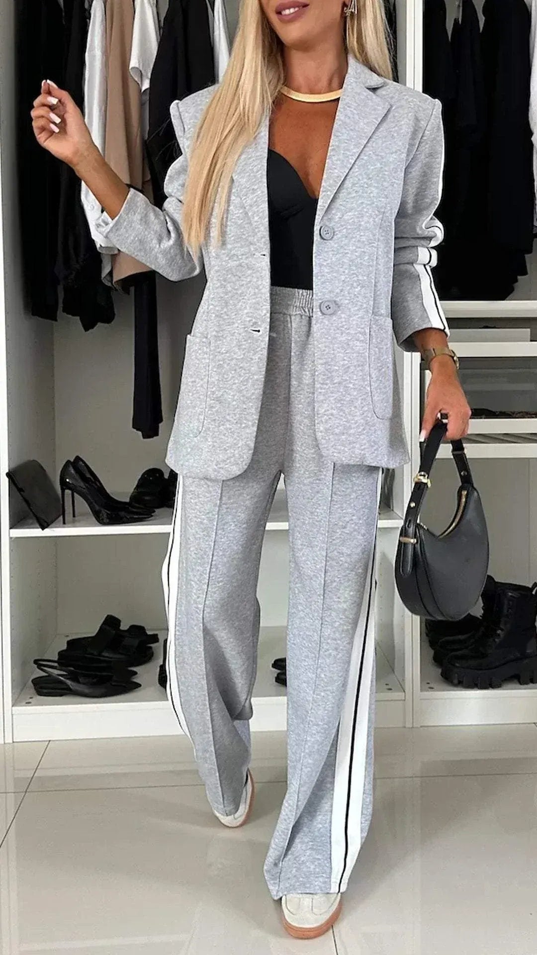 Claudia / Conjunto a rayas con blazer y pantalón