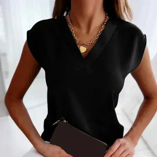 Noelia / Blusa de seda  sin mangas con cuello en V