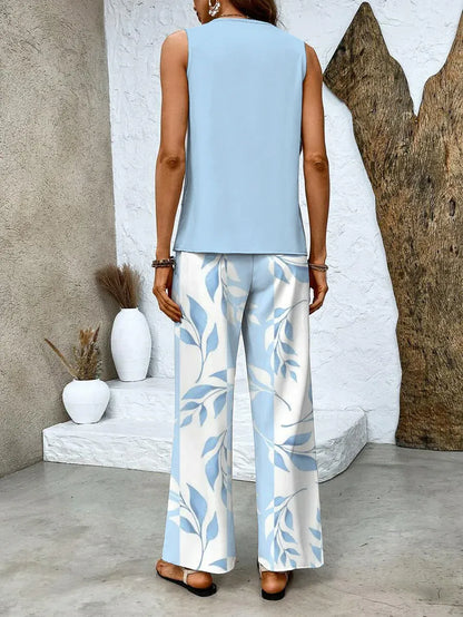 Maité - Conjunto azul de dos piezas con estampado floral y cuello cuadrado